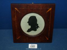 A fine George III ink on paper silhouette in a substantial inlaid mahogany frame, 7" square (frame),