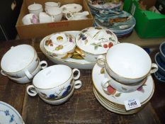 A small quantity of Royal Worcester 'Evesham' dinnerware including six soup coups and saucers,