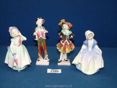 A pair of Royal Doulton figures 'Pearly Boy' and 'Pearly Girl,' slight chip to base of boy,