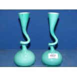 A pair of unusual turquoise glass Vases by Normann Copenhagen in 'Swing' design with white interior,