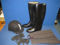 A pair of Aigle riding boots size 40, a riding hat size 56, half chaps, etc.