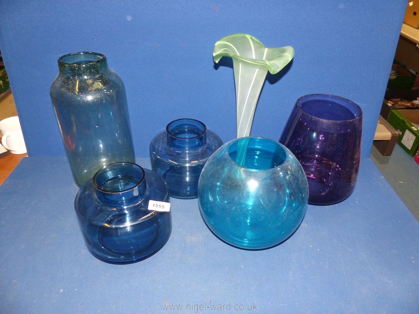 A quantity of coloured glass vases including pair of blue, tall green and white frosted fluted rim,