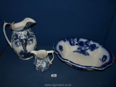 A large blue and white Poppy design wash jug, Tunstall wash bowl and Adams & Co 'China Chang' jug.
