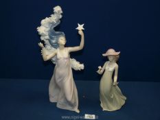 A Lladro inspiration Millennium 1998 figure of a girl holding a star with a cloud of stars and
