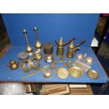 A quantity of brass including Eastern style coffee pots, pot pourri, curtain rings, lamp bases,