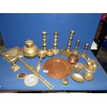 A quantity of brass and copper including candlesticks, chestnut roaster, pin dishes, plate etc.