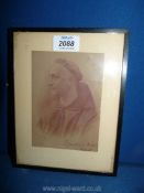 A small framed lithograph depicting Father Ignatius,