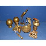 A box of brass ornaments including teapot, goblet, birds etc.