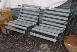A pair of metal framed and slatted wood Garden chairs, 22" wide x 28" high.