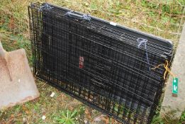 A Kong Dog metal cage, 3' x 23".
