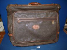 An original Mulberry Scothgrain brown leather suit Carrier with hangers.