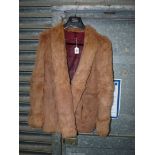 A vintage fur Jacket with turn-up cuffs and slit pockets.