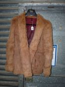 A vintage fur Jacket with turn-up cuffs and slit pockets.
