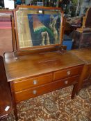 A circa 1930 Mahogany dressing Table having two short and one long drawers with drop ring handles