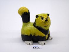 A Lorna Bailey 'Fluffy the cat' in yellow and black, signed to base, 5" tall x 4 1/2" wide.