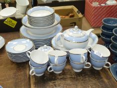 A Royal Doulton blue and white dinner/tea service including seven dinner plates, eight bowls,