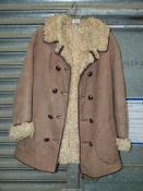 An Antartex tan coloured sheepskin Jacket, made in Scotland, size S/M,
