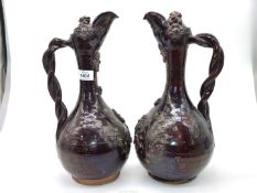 Two 'Demoiselles d'Avignon' Canakkale Pottery ewers in brown glaze decorated with stylized flowers