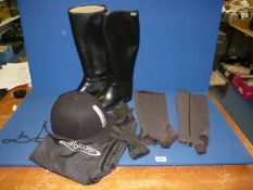 A pair of Aigle riding boots size 40, a riding hat size 56, half chaps, etc.
