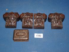 An early Victorian carved wood Snuff Box with a raised floral design to the cover and four small