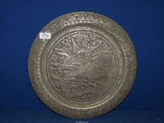 A metal wall plaque depicting Archer on horseback design, 15 1/2'' diameter.