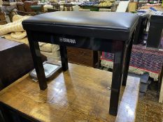 A Yamaha piano stool with high gloss polished Ebony frame and black upholstered seat,
