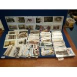 A box of vintage postcards, some in sleeves (200 plus).