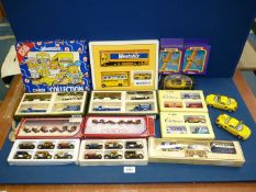 A box of model cars and models to include Corgi 'Weetabix', Corgi 'Cadburys', Days Gone,