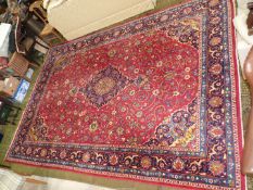 A large Iranian carpet, polychrome colours, 100% wool pile, 13' 4" x 9' 4".