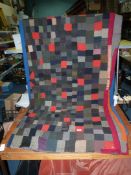 A 19th c Welsh made Patchwork Quilt, made by Benjamin Jones (weaver) from off-cuts from Ogof Mill,