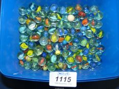 A quantity of coloured glass marbles.