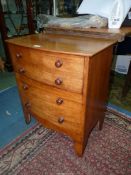 A Satinwood Commode Chest, unfurnished, with turned knobs, 24'' x 15;; x 28 1/4'' high.