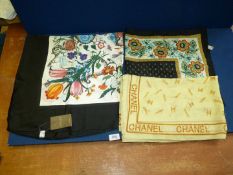 A Gucci silk scarf with label, Chanel scarf and a Mary Quant vintage scarf.