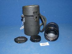 A Spiratone 135mm f/2.8 Lens in Canon FD fitting with cover and carrying case.