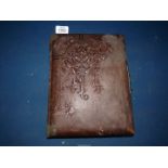 A large leather bound photograph Album, empty, 12" x 9".