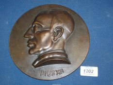 A large and heavy solid bronze Plaque of Pope Prius XII, 7 1/2'' diameter.