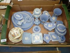 A large quantity of blue and white Wedgwood 'Jasperware' plates, trinket dishes and vases,