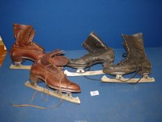 Two pairs of vintage Harrod's Ice skates, size 6, blade no. 72 and no. 43.