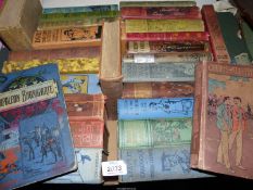 A box of old novels including Chums All Through, Through the Looking Glass,