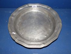 A heavy Pewter charger with scalloped edge, 14 1/2'' diameter.
