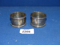 A pair of Silver napkin rings, London 1915, 85 gm.