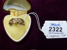 A 9ct gold Clogau ring with Tree of life open work top, size T.