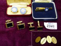 A pair of 12 ct gold Cufflinks with engine turned decoration, 7 gms.