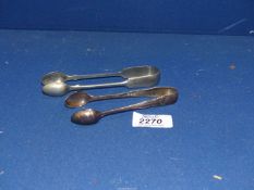 Two pairs of sugar tongs, one being silver, Birmingham 1898, makers J.R.L.