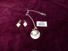 A 925 silver mounted shell pendant,
