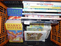 A crate of children's books: Blue Peter annuals, Harry Potter etc.