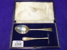 A cased Silver Christening spoon and pusher, London, Mappin & Webb.