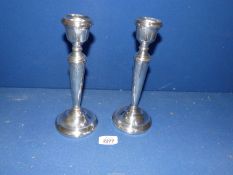 A pair of Silver candlesticks, Birmingham 1972, (FH) Francis Howard Ltd, 9 1/4" tall, weighted.