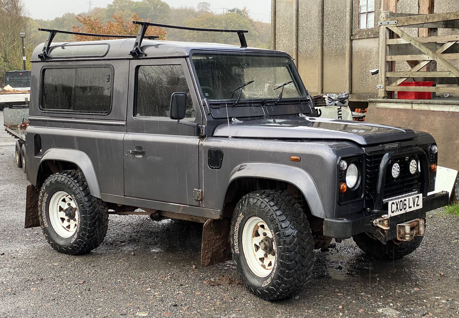 A Land-Rover Defender 90 short wheel-base TD5 Diesel-engined hardtop in metallic grey/ gunmetal and