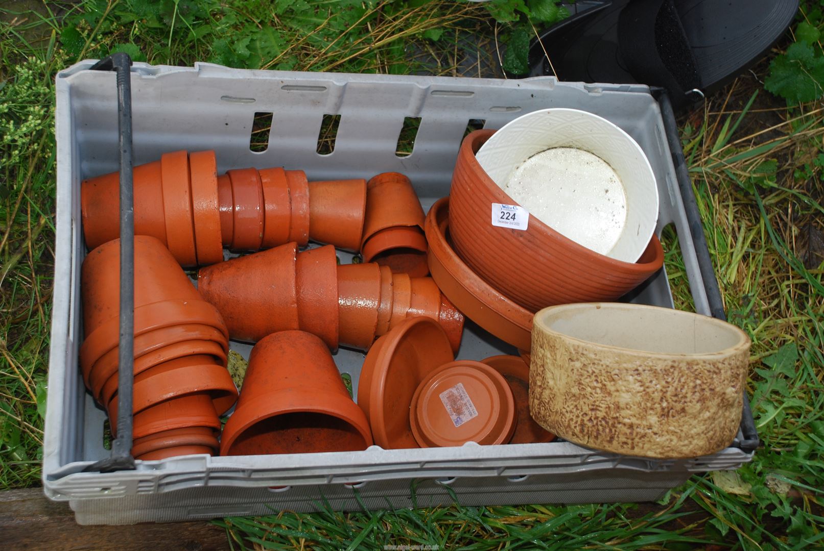 Various terracotta pots and saucers.